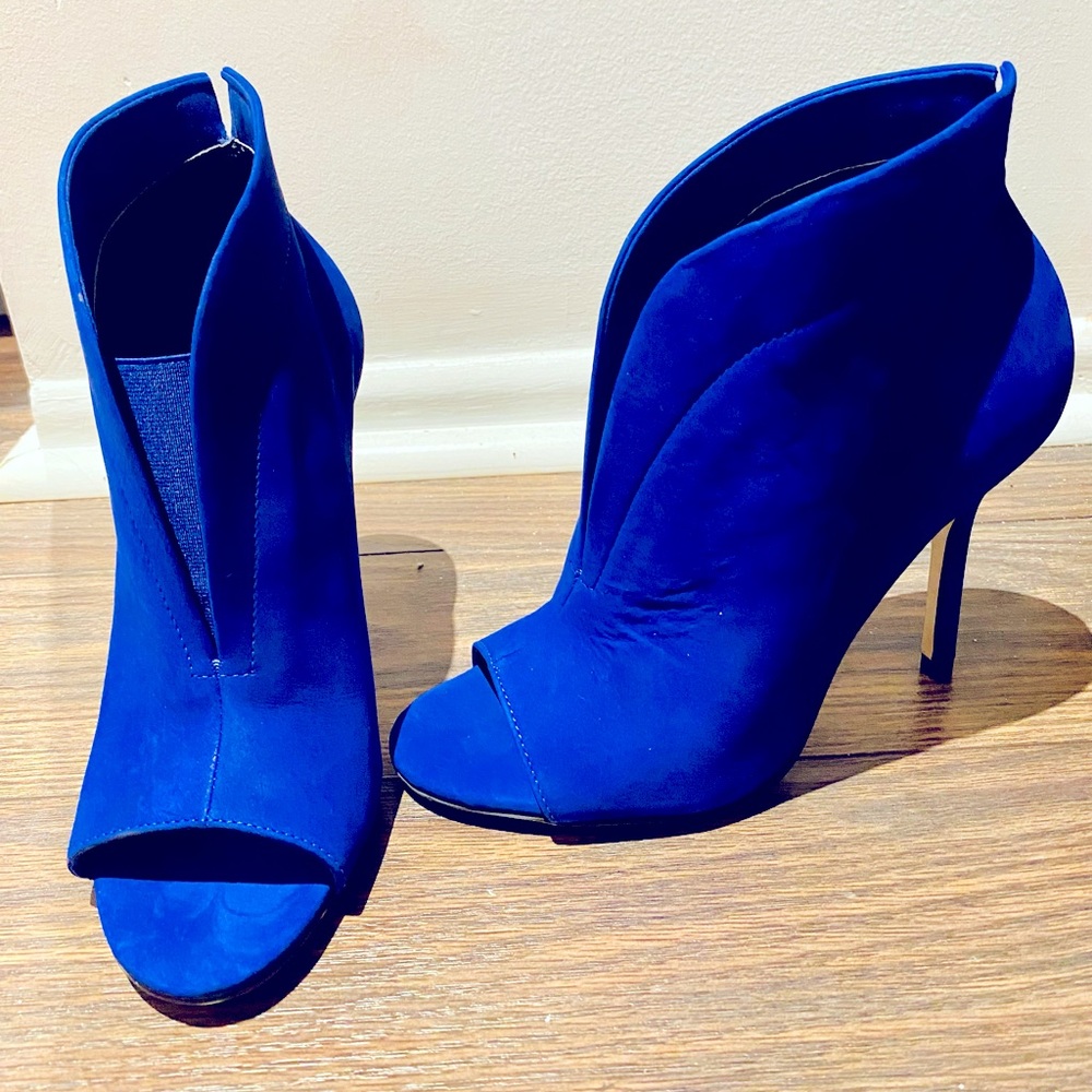 Never been worn, blue suede ankle booties. Size 6